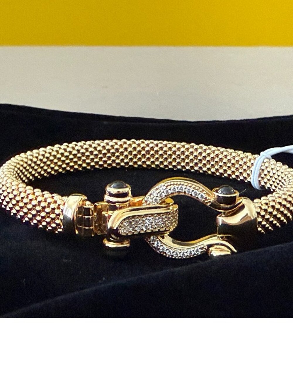 NWT Mia Fiore 18K Gold Plated Bronze horseshoe clasp with black spinel Bracelet